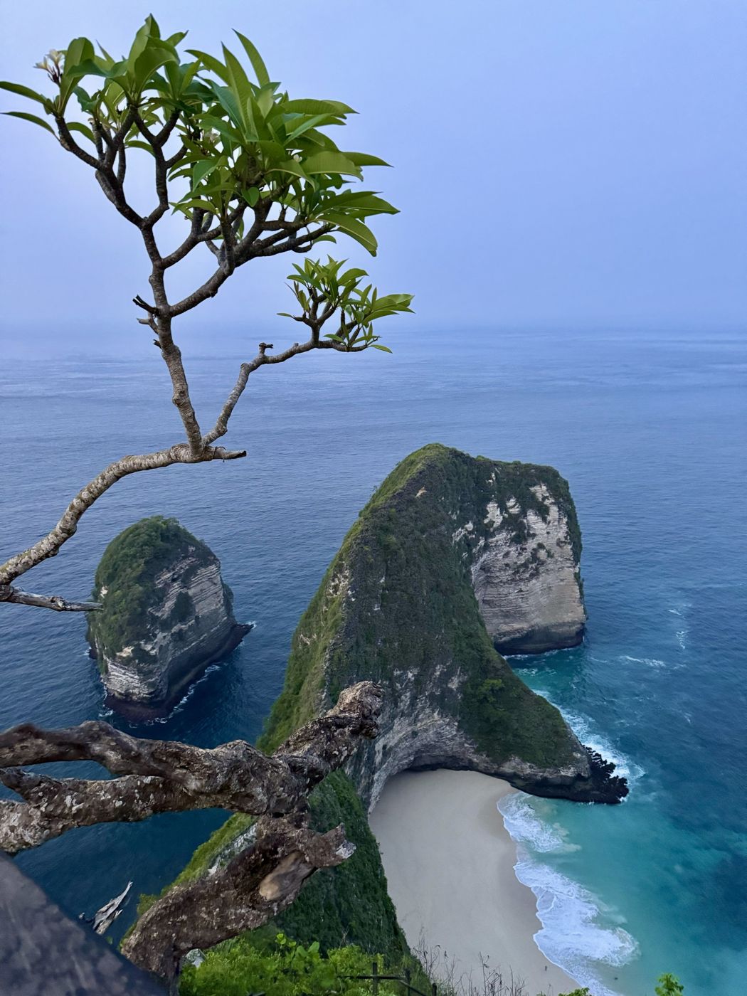 Sea cliffs and a white-sand beach on Nusa Penida